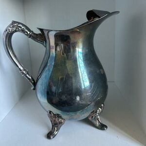 Vintage Silver Plate Water Pitcher Footed w/ Ice Lip Ornate Handle, Patina 8”
